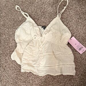 Women's Cream Sleeveless Top